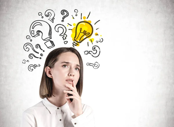 Thoughtful young businesswoman looking for answers — Stock Photo, Image