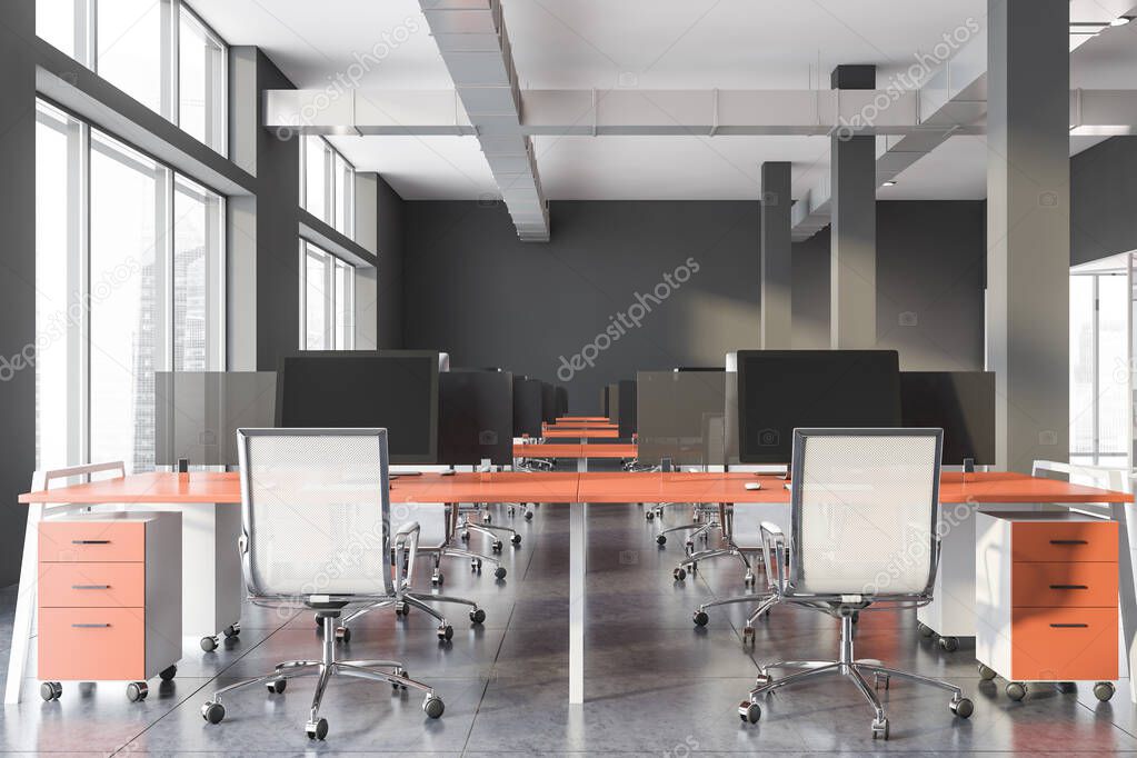 Gray industrial style office with orange tables