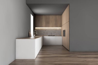 Beyaz tezgahlı gri mutfak.