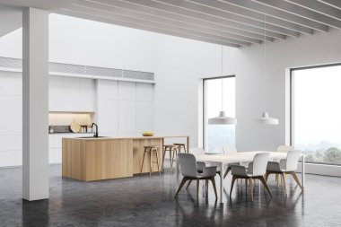 Bar ve yemek masası olan beyaz mutfak köşesi.