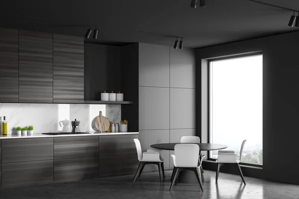 Loft angolo cucina grigio con tavolo rotondo — Foto Stock