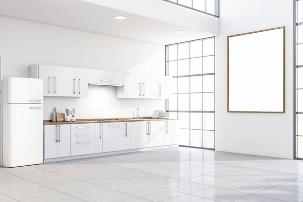 Canto da cozinha branca com geladeira e cartaz — Fotografia de Stock