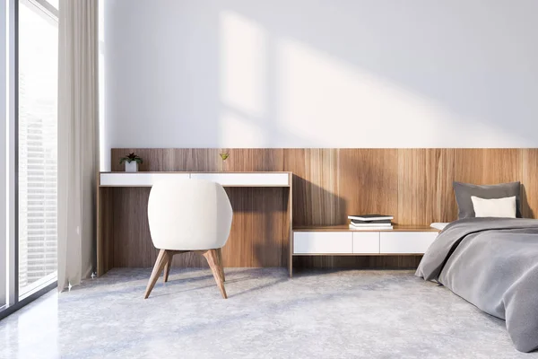 Table et fauteuil dans la chambre principale blanche — Photo