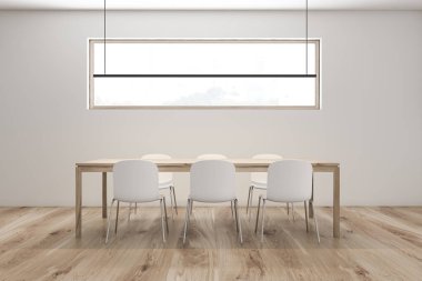 Masası olan minimalist tavan arası beyaz yemek odası.