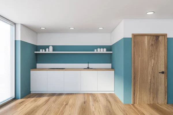 Blue kitchen interior with countertops