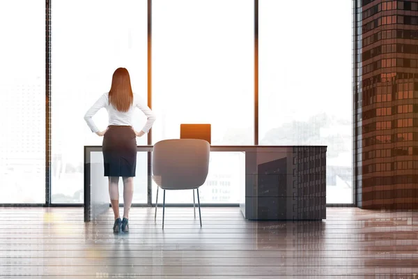 Woman in orange panoramic home office — Stock Photo, Image