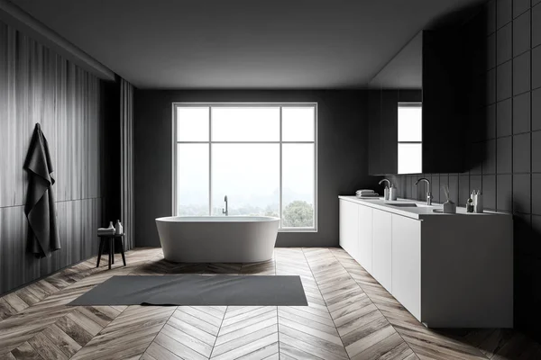 Interno bagno grigio scuro con vasca e lavabo — Foto Stock