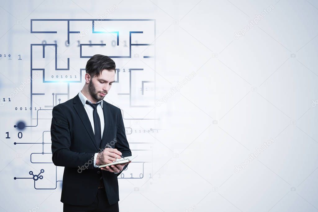 Businessman with notebook looking for solution