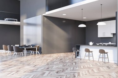 Gri yemek odası ve barı olan mutfak.