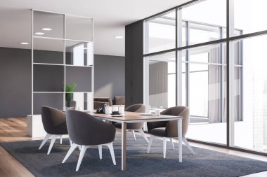 Koltuk ile gri yemek odası köşesi