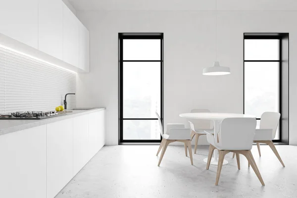 Loft cuisine blanche avec table ronde — Photo