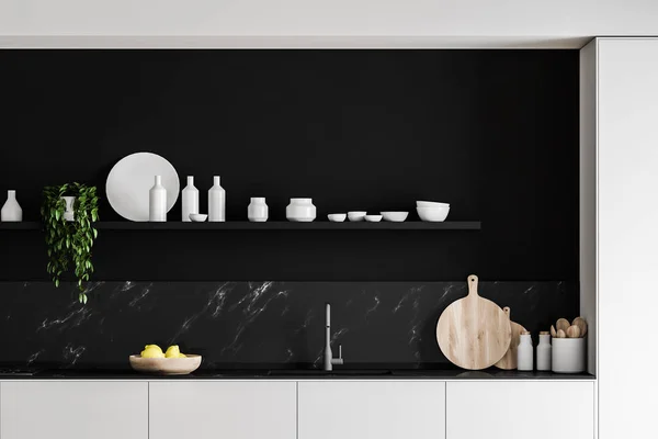 Bancadas brancas na cozinha preta — Fotografia de Stock