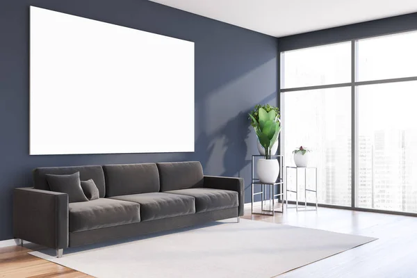 Angolo soggiorno blu con divano e poster — Foto Stock