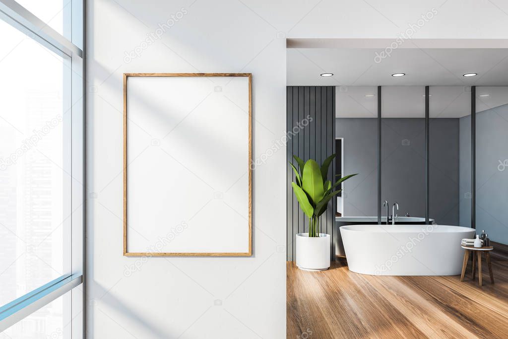 White and gray bathroom, tub and poster