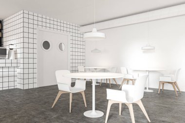 Yuvarlak masalı rahat bir restoran köşesi.