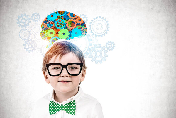 Cute little boy brainstorming process