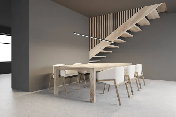Coin salle à manger gris minimaliste avec escaliers — Photo