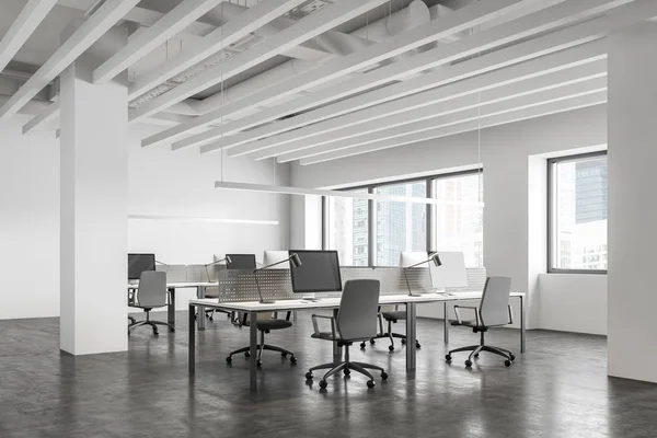 White open space office corner with columns