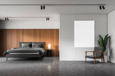 Posteri ile beyaz ve ahşap yatak odası