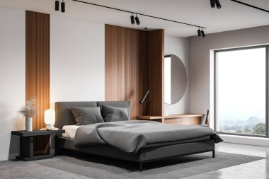 Yuvarlak aynalı beyaz yatak odası köşesi