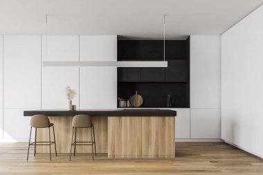 Barlı beyaz ve siyah mutfak.