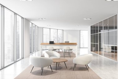 Birlikte çalışma ve dinlenme alanı olan beyaz ofis.