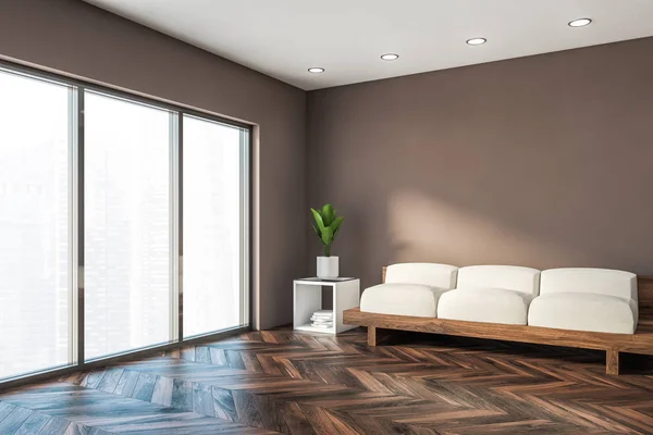 Canto da sala de estar marrom minimalista com sofá — Fotografia de Stock