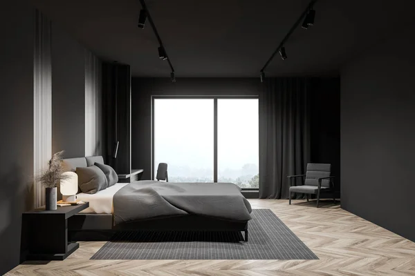 Grijze master bedroom met fauteuil, zijaanzicht — Stockfoto