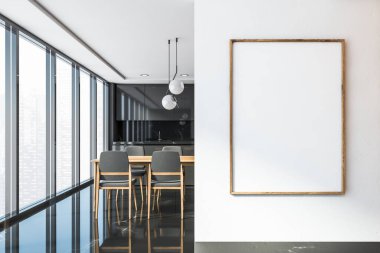 Black and white kitchen interior with poster