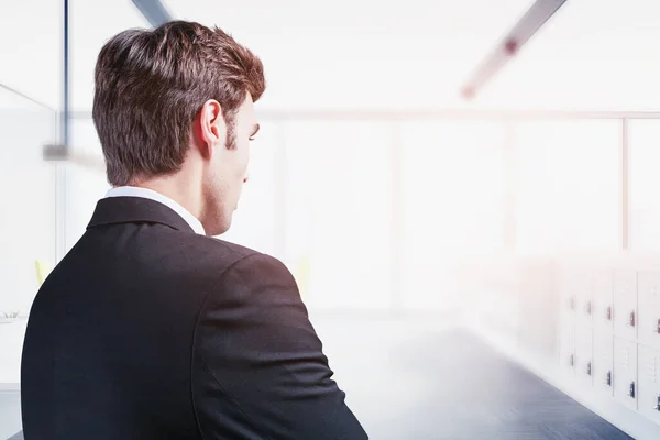 Side view of young businessman in offfice — Stock Photo, Image