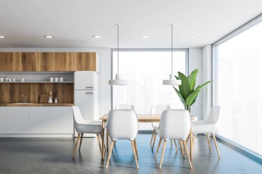 Masa ile beyaz ve ahşap mutfak iç