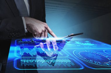 Businessman with tablet, infographic interface