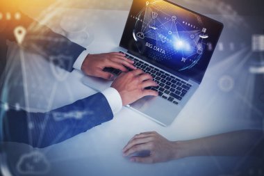 Man and woman using big data interface