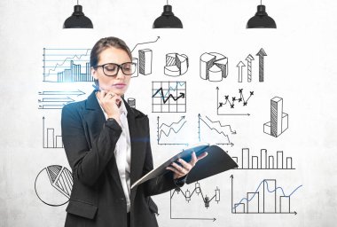 Not defteri olan genç ekonomist, grafik tipleri