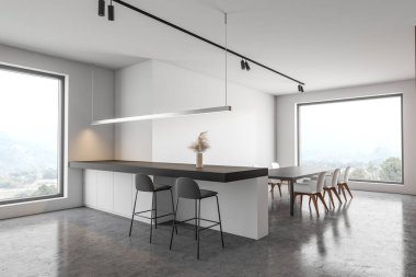 Bar ve masa ile beyaz mutfak köşesi