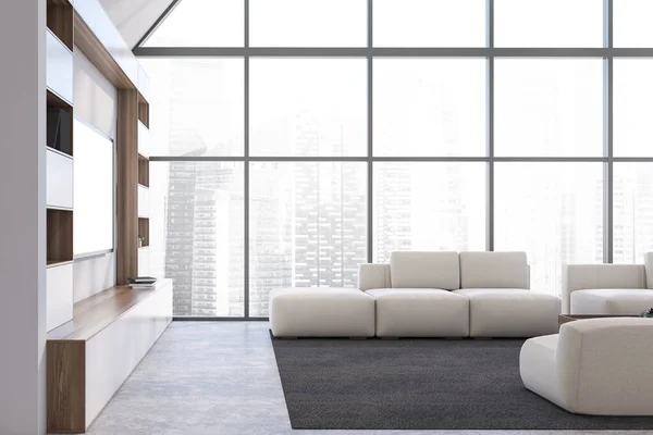 本棚とソファ付きの白いリビングルーム — ストック写真