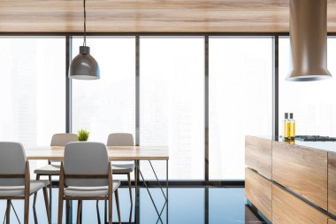 Masası ve adası olan şık panoramik mutfak.