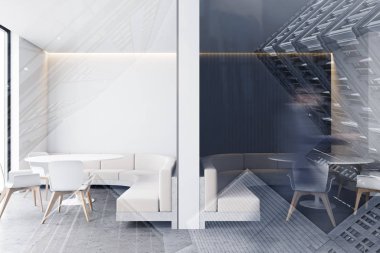 Adam siyah-beyaz restoranda yürüyor.