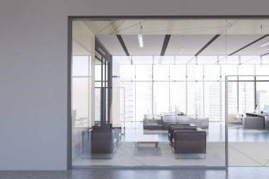 Gri bekleme odasının içi koltuklarla dolu.