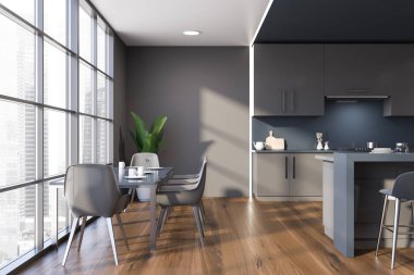 Gri ve mavi mutfak ve yemek masası