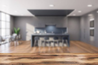 Bulanık gri mutfak masası ve çubuk.