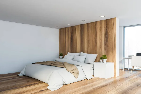 Белая и деревянная спальня с домашним офисом — стоковое фото