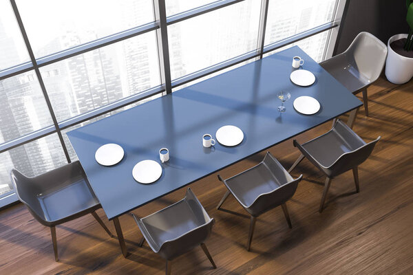 Gray dining room with laid table, top view