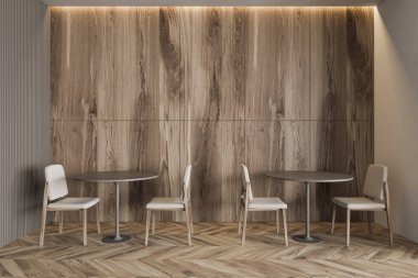 Ahşap ve gri duvarlı, ahşap zeminli ve rahat sandalyeli gri yuvarlak masalı minimalist restoranın içi. 3d oluşturma