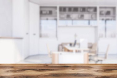 Ürününüzün masası bulanık patron ofisinde, beyaz duvarları, beton zemini, bej sandalyeli beyaz masa, gardırop ve kitaplığın yanındaki rahat kanepe. 3d oluşturma