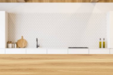 Ürününüz için ahşap masa bulanık mutfakta, beyaz tezgahları, altıgen fayans duvarları, ahşap çatısı ve ocağı ve lavabosu var. 3D oluşturma maketi