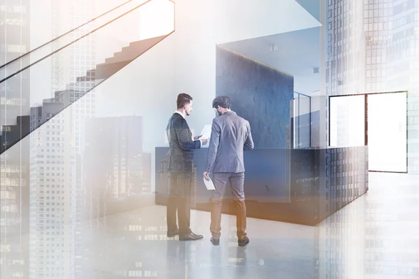 Two Businessmen Discussing Work Modern Office Hall White Walls Concrete — Stock Photo, Image