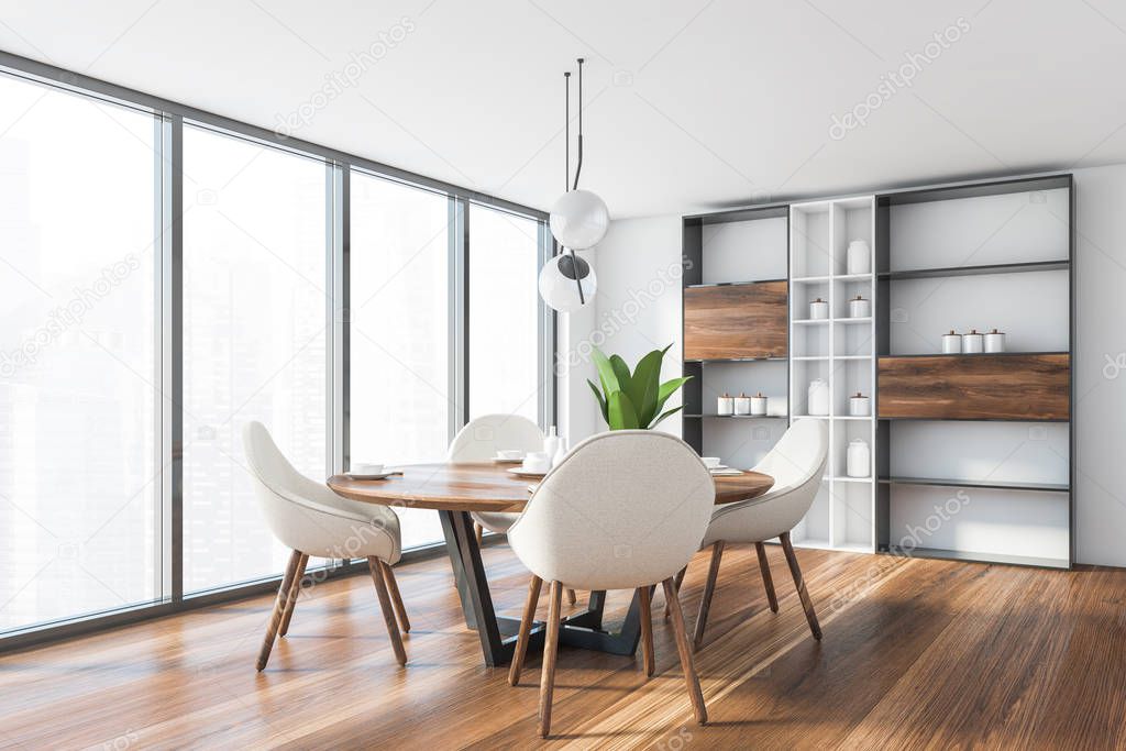 Corner of panoramic dining room with white walls, wooden floor, round table with white chairs and cupboard. Window with blurry cityscape. 3d rendering