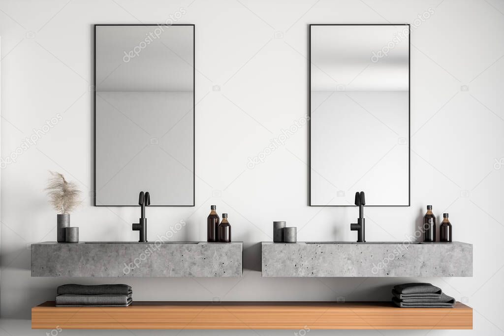Stone double sink with vertical mirrors above it standing in modern bathroom with white walls and wooden shelf with towels. 3d rendering