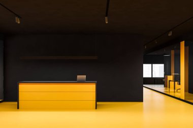 Sarı ve siyah duvarları olan şık bir ofis salonu, dizüstü bilgisayarı olan parlak bir resepsiyon masası ve arka planda açık bir alan. 3d oluşturma